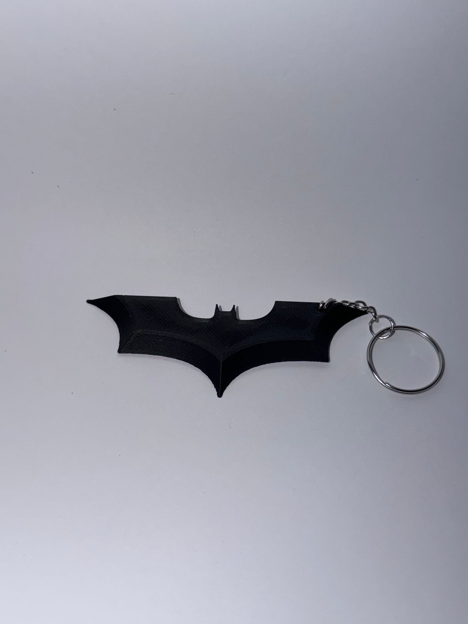 Llavero de Batman - Silueta Logo de Cómic con Acabado Premium